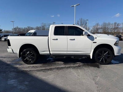 2014 RAM 1500 4WD Quad Cab 6.4 Ft Box Sport